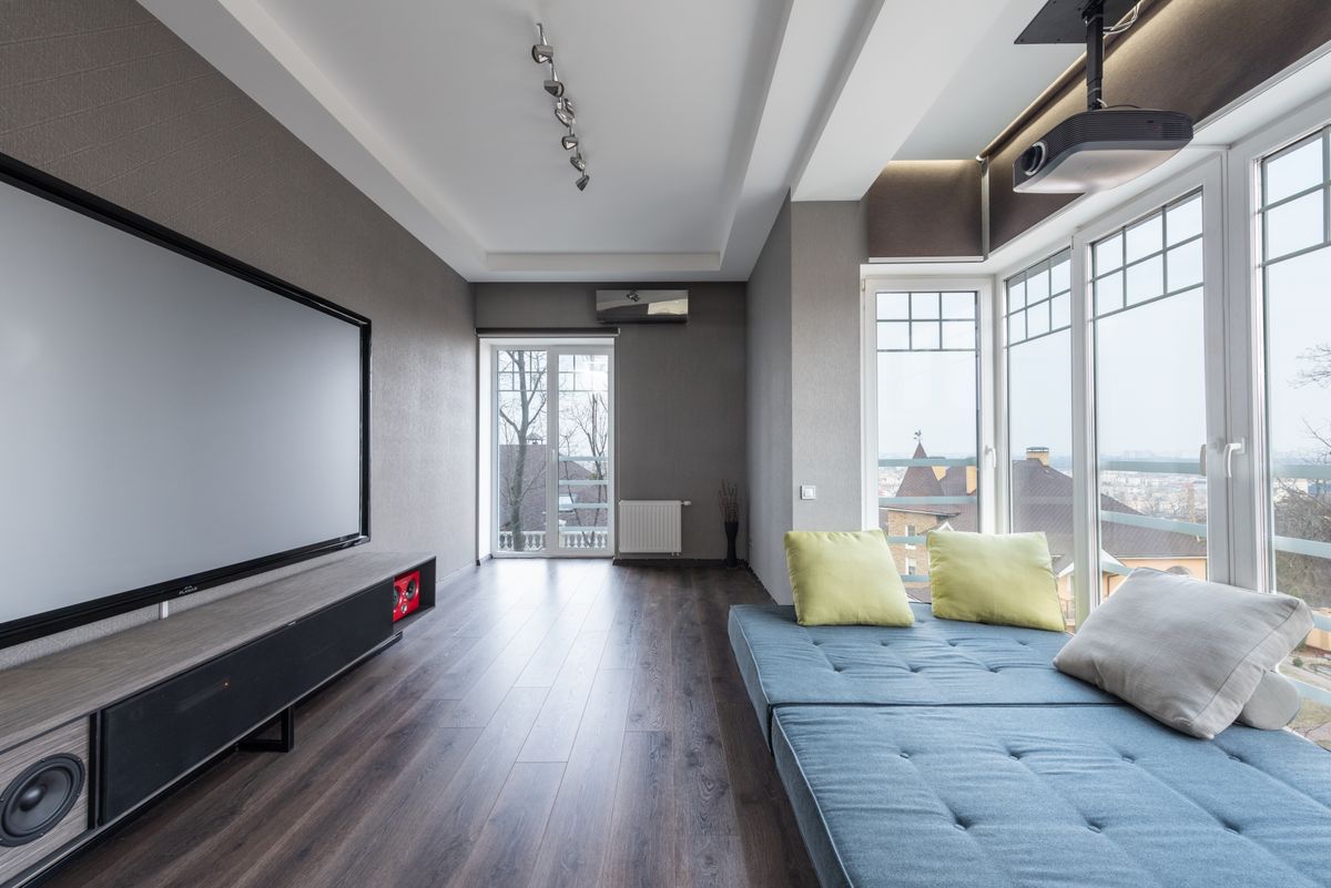 Home theater room with a large screen